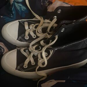 Converse Chuck Taylor Hi-Lugged Sneakers.